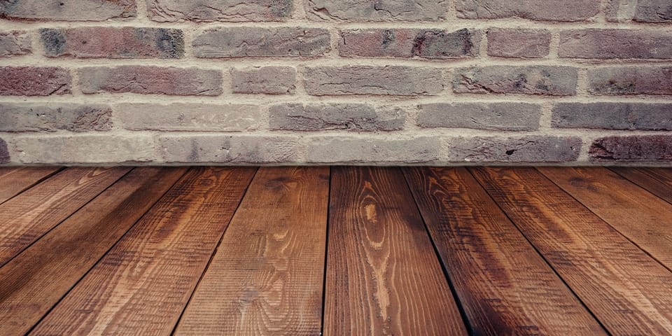 wood-floor-brick-wall